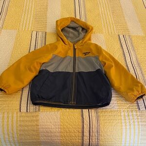 Toddler boys OshKosh jacket. Dark yellow, gray, navy color.